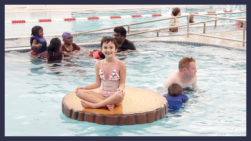New Farmington Hills Indoor Pool at The Hawk Aquatics Center 4 Naomi enjoying the lily pad at the Hawk Indoor Pool